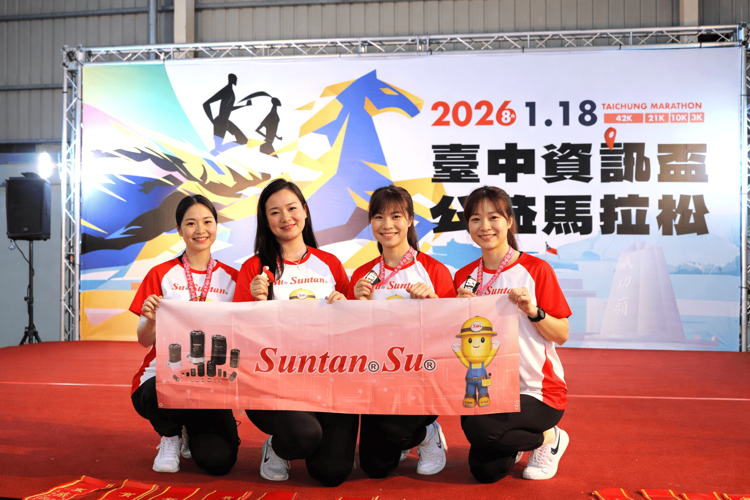 Suntan corporate ESG activity team at charity marathon sustainability event